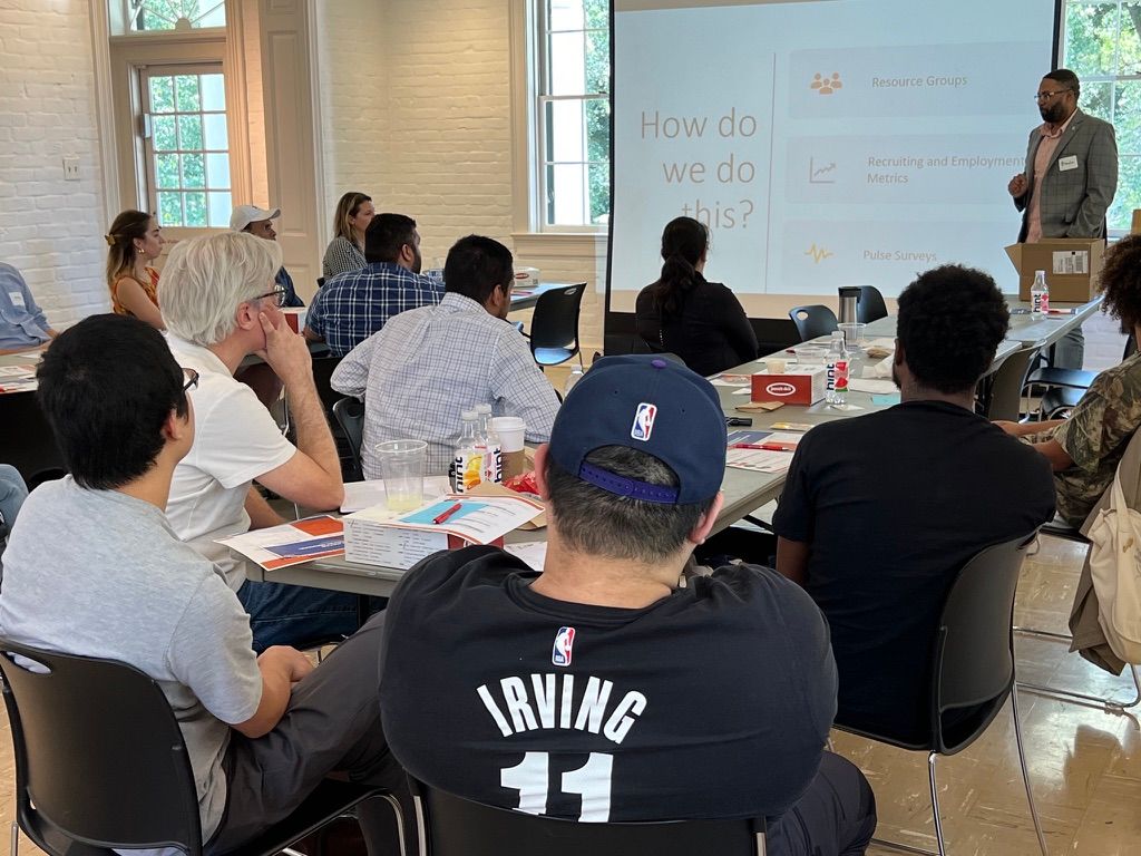 Brandon Smith working with a leadership team